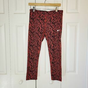 Nike dri-fit orange and blank leggings  size Medium
